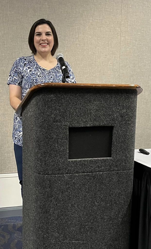 speaker in front of podium